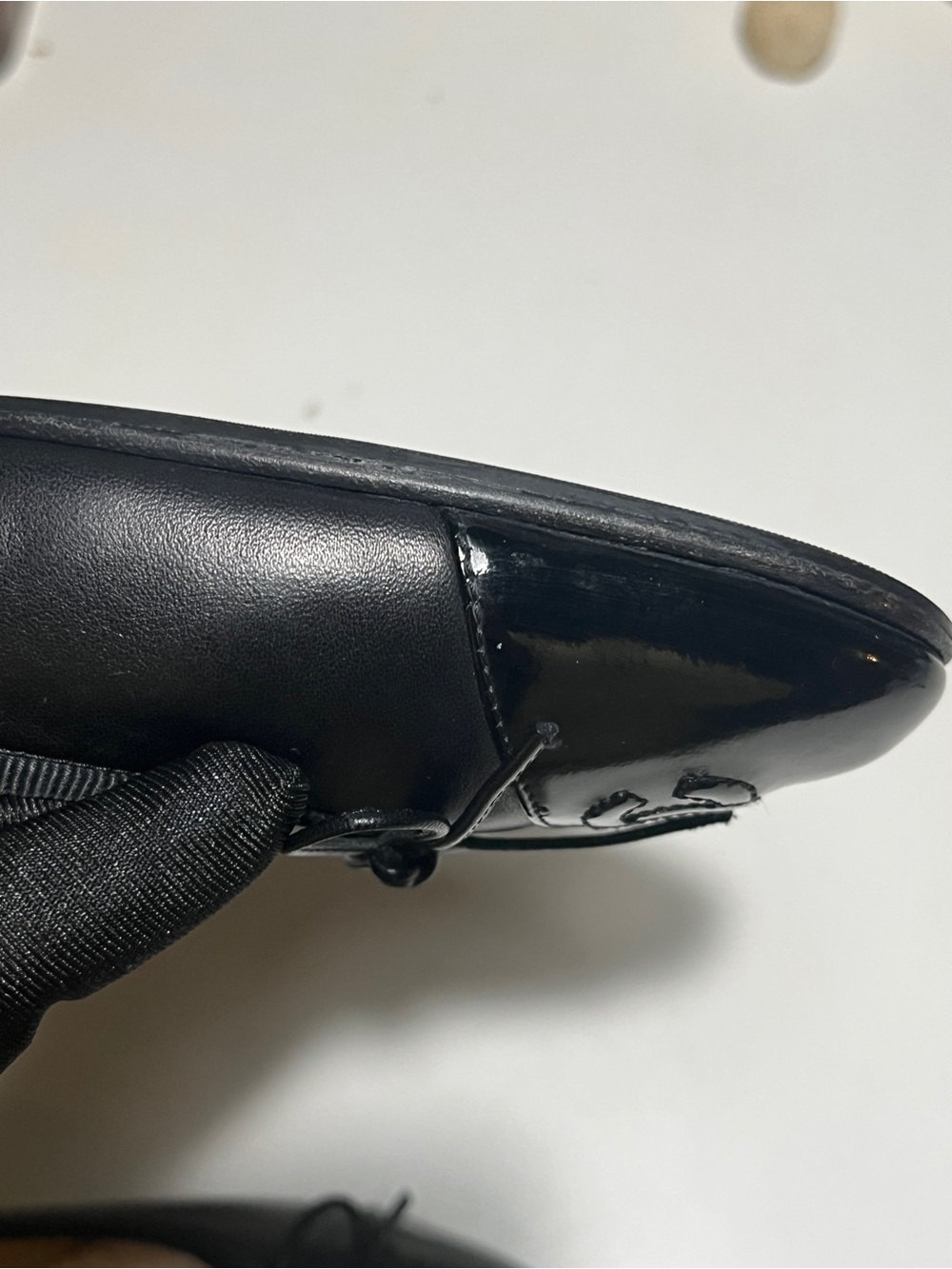 CHANEL Black Leather Ballet Flats with Patent Cap Toe and Logo - Picture 12 of 14